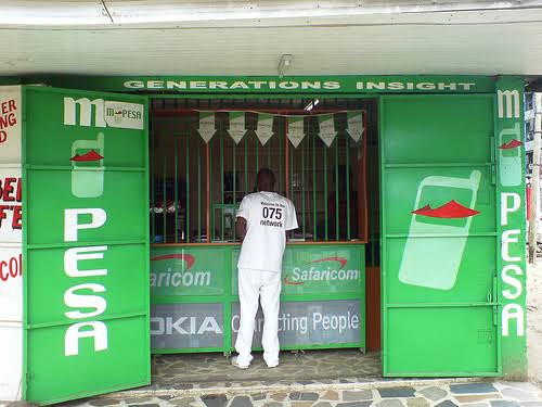 A customer at an Mpesa outlet.